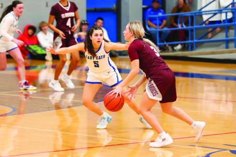 The Childress Lady Cats open the season with an overtime 43-42 win against the Clarendon Lady Broncos Saturday, Nov. 12. Photo by Elizabeth Gamboa