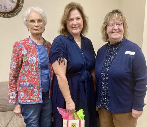 Modern Home Club hostesses Mary Ann Hickman, left, and Sandra Moody, right, welcome Childress County Judge Kimberly Jones, who served as guest speaker at the club’s Thursday, Oct. 16 meeting at the Childress Municipal Development District. Modern Home Club