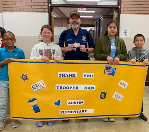 Memphis Independent School District students and staff celebrate National School Resource Officer Day Thursday, Feb. 15, thanking Memphis ISD Security Director Dan Hawthorne. Additionally, Hawthorne visited Austin Elementary School students to discuss the STOPit Anonymous Reporting System, which allows individuals to anonymously report safety, misconduct or compliance concerns to help others or connect with trained crisis counselors from the Crisis Text Line. Photo Courtesy of Memphis ISD
