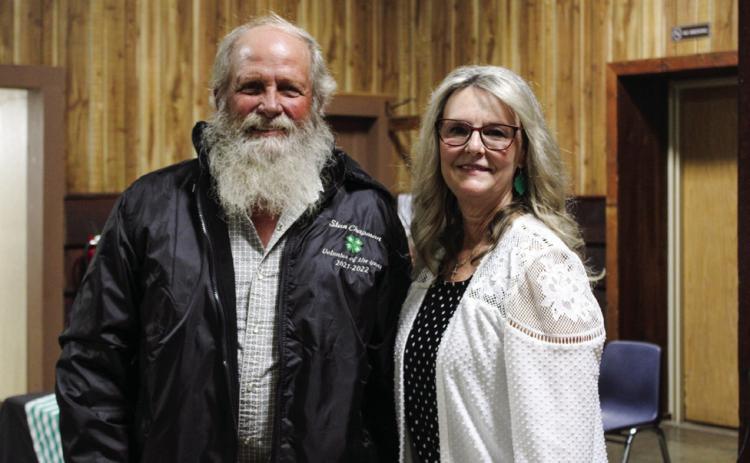 Stan Chapman receives 2021-22 Volunteer of the Year from Childress County Extension Agent Dawn Dockter.