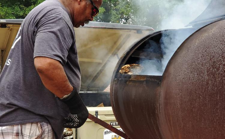 The First Annual Ozark Trail Hog Wild Rib Cookoff is held on the square in downtown Estelline Saturday, Aug. 20. Raising funds for a new Estelline Community Center, $2,500 of prize money was donated by Hunger Aid, a nonprofit organization which assists those in need by providing fresh food and support in worrisome times. Photos Courtesy of the Memphis Chamber of Commerce