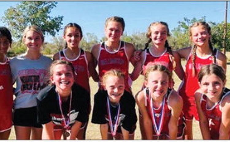 Lady Firecrackers claim the District Championship over six teams at the Shamrock Country Club Wednesday, Oct. 12. Taytum Kane placed second, Ceighley Killian fourth and Elli Ouellette ninth. Front, from left: Killian, Kane, Ouellette, Anna Henard. Back, from left: Ayz’lin Menefield, Maggie Tillman, Ingrid Granadoz, Ellie Thomas, Addi English, Maci Brewer. Courtesy Photo