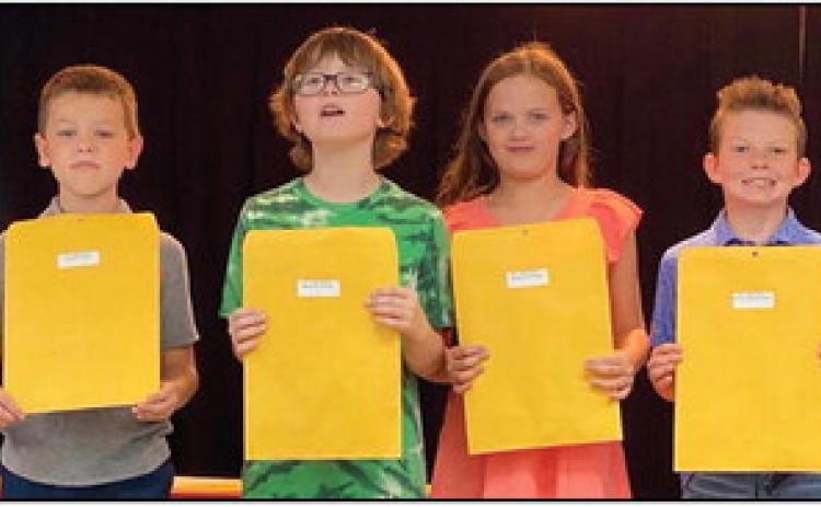 Kurby Mitchell’s third graders accept A Honor Roll, Perfect Attendance and American Citizenship awards as follows. From left: Carter Smith, A Honor Roll, Perfect Attendance; Michael Stiles, A Honor Roll, American Citizenship; Berkeley Ward, A Honor Roll; Holden Wischkaemper, A Honor Roll, American Citizenship.