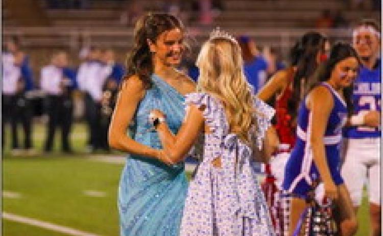 Childress High School (CHS) senior Chloe Churchill is crowned 2023 CHS Homecoming Queen by 2022 CHS Homecoming Queen Kate Taylor during halftime at the Childress vs. Bowie game Friday, Sept. 22 at Fair Park Stadium. Photos by Childress High School Yearbook Staff