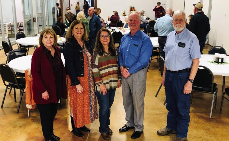 Wellington Senior Citizens Center Board of Directors, including President Peggy Allred, left, Secretary-Treasurer Margret Wood, Karen Caldwell, Richard Sims and Oran Sain, welcome visitors to the recent Open House. The Red River Sun/Bev Odom