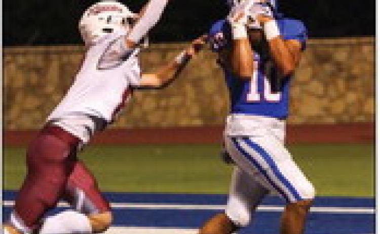Childress’ Isaiah Jalomo (10) catches a 24-yard pass from quarterback Drake Rabe in the Bobcat endzone during the third quarter Friday, Sept. 22 at Fair Park Stadium. Photos by Childress High School Yearbook Staff